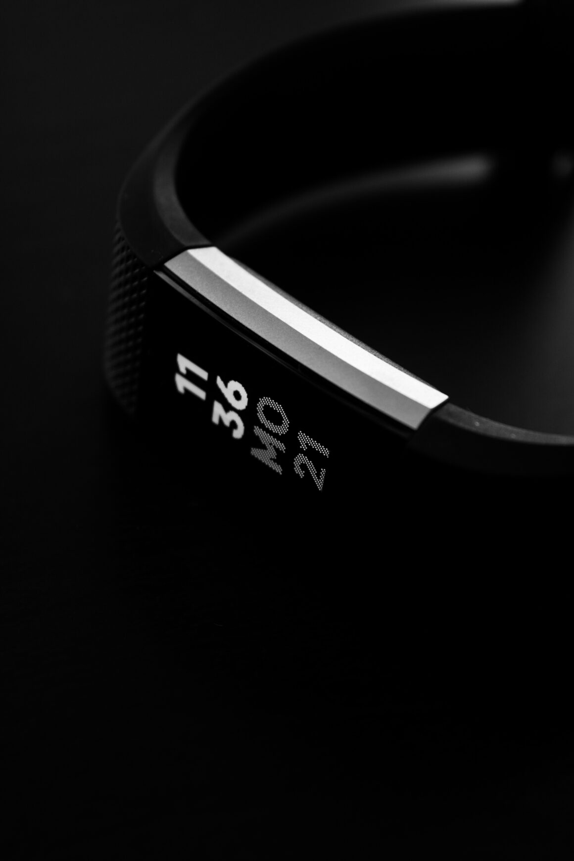 Fitbit Watch on Black Background